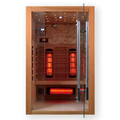 Heliox LuminaWood infrared sauna cabin by Recovery & Wellness HQ featuring wooden interior and infrared panels for relaxing heat session.