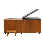 Wooden TimberChill Glacier Pro Cedar Ice Bath from Recovery & Wellness HQ, shown filled with cold water 